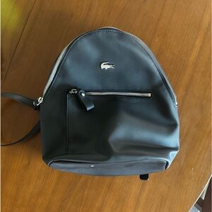 Lacoste Black Mini Backpack Bag. Small signs of wear (see photos)